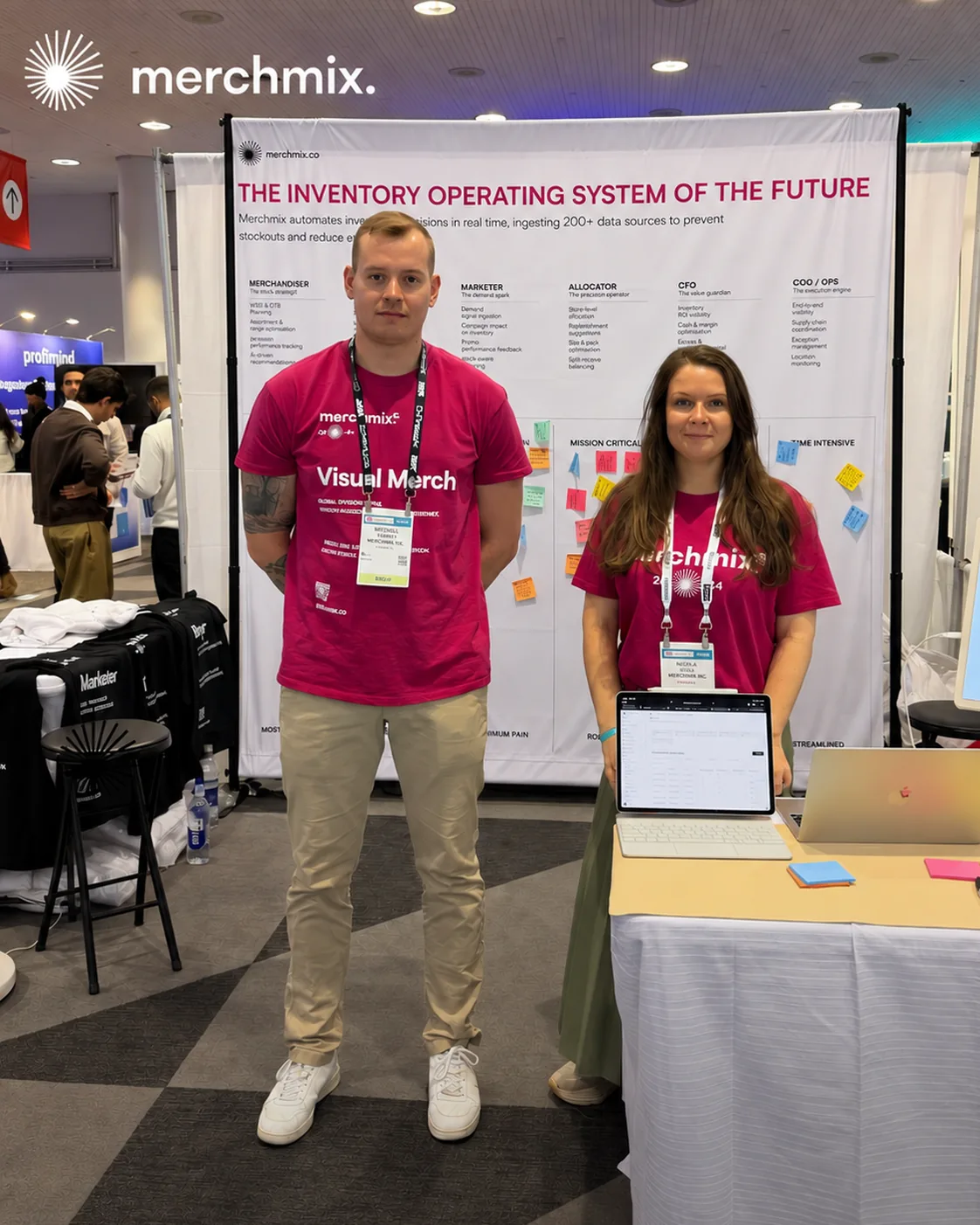 Two merchmix team members at the merchmix stand, NRF 2026 in New York